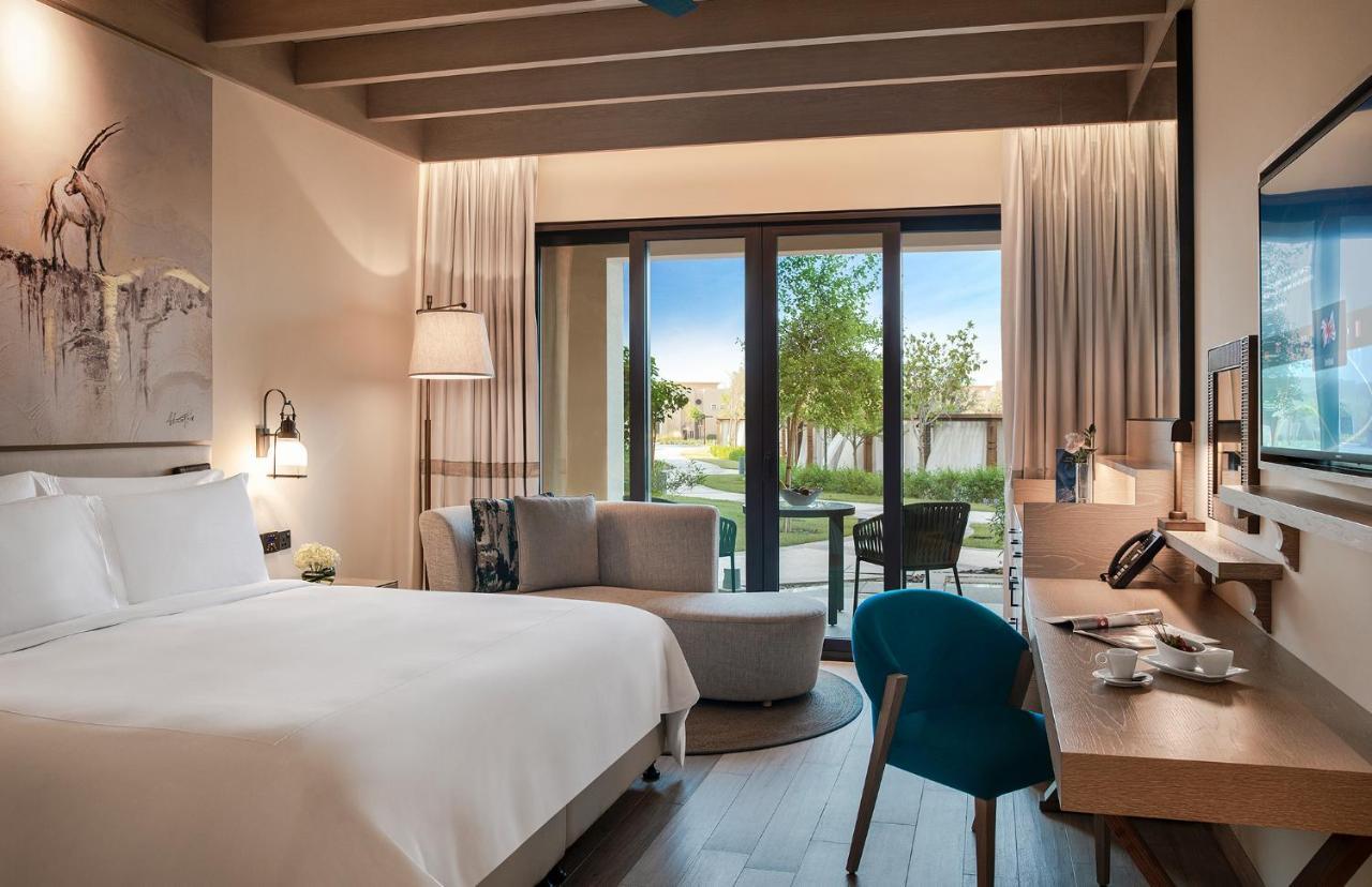 Saadiyat Rotana Resort And Villas Abu Dhabi Esterno foto Deluxe Room